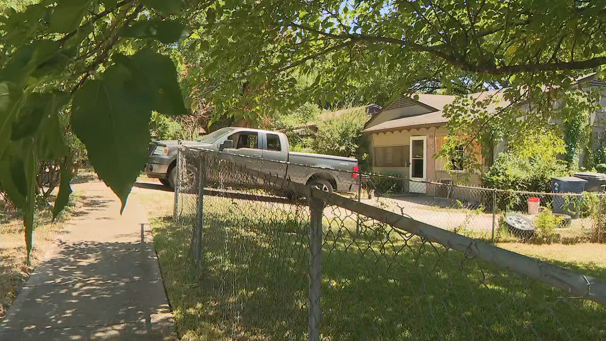 A pickup truck parked outside the house of dog attack victim Lea Freeman