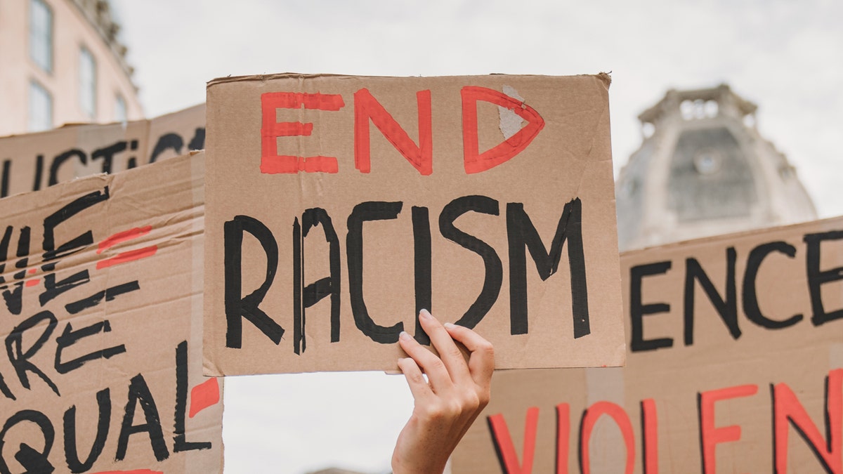 "End Racism" sign