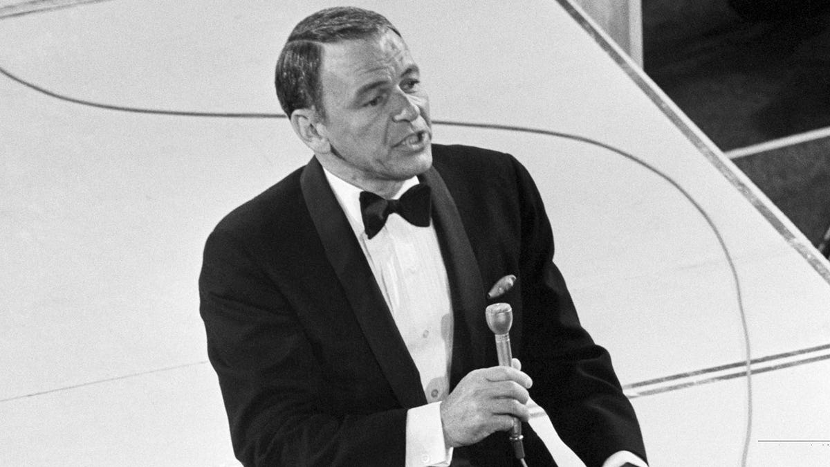 Frank Sinatra on the side of the stage at the 1969 Academy Awards.