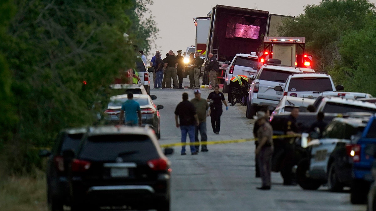 Investigators work the scene of the deadly migrant trailer case that left 53 dead 