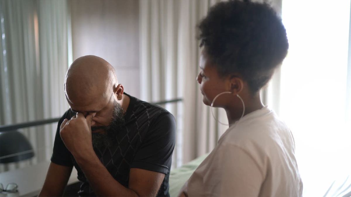 Upset father with daughter