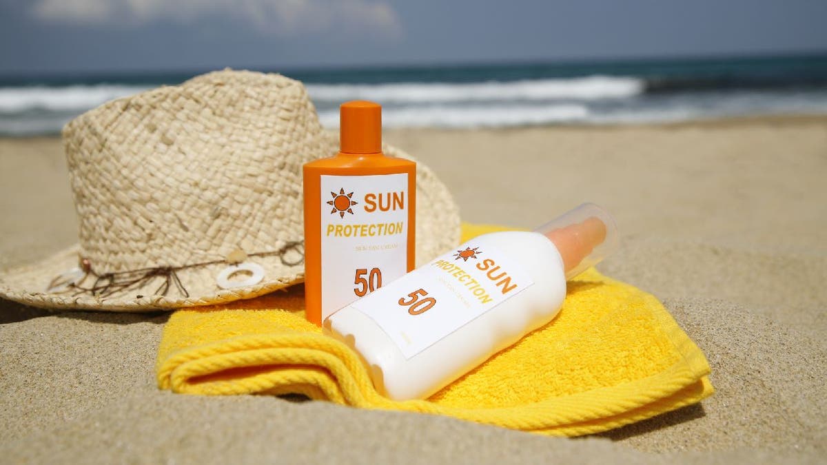 Sunscreen bottles on beach