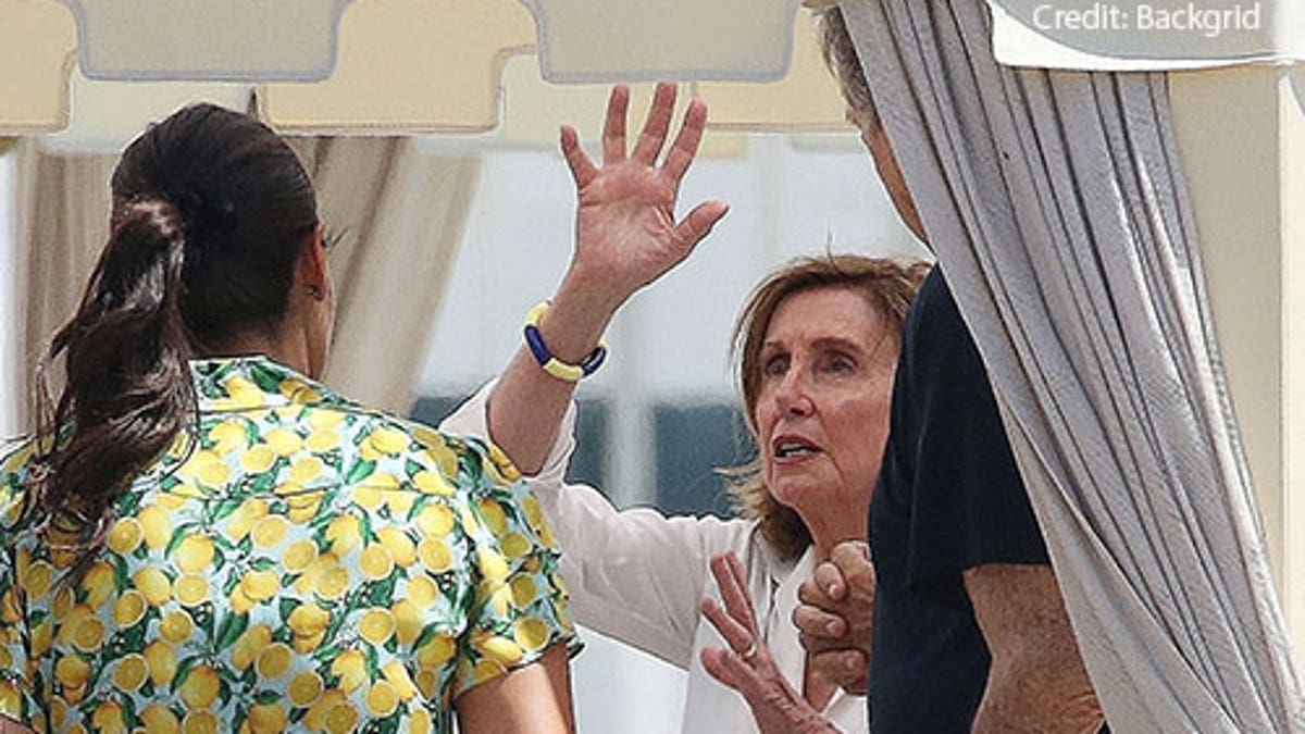 See the pics Pelosi hits Italian beach in luxury vacation as