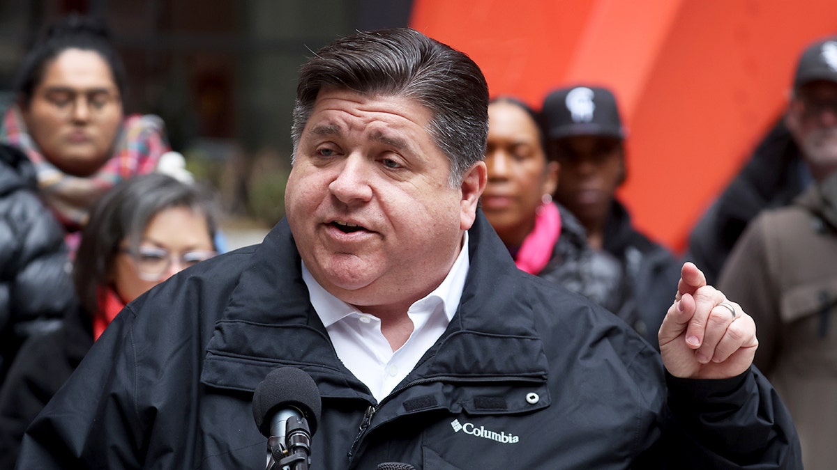 Pritzker speaking to audience in Chicago in April 2022