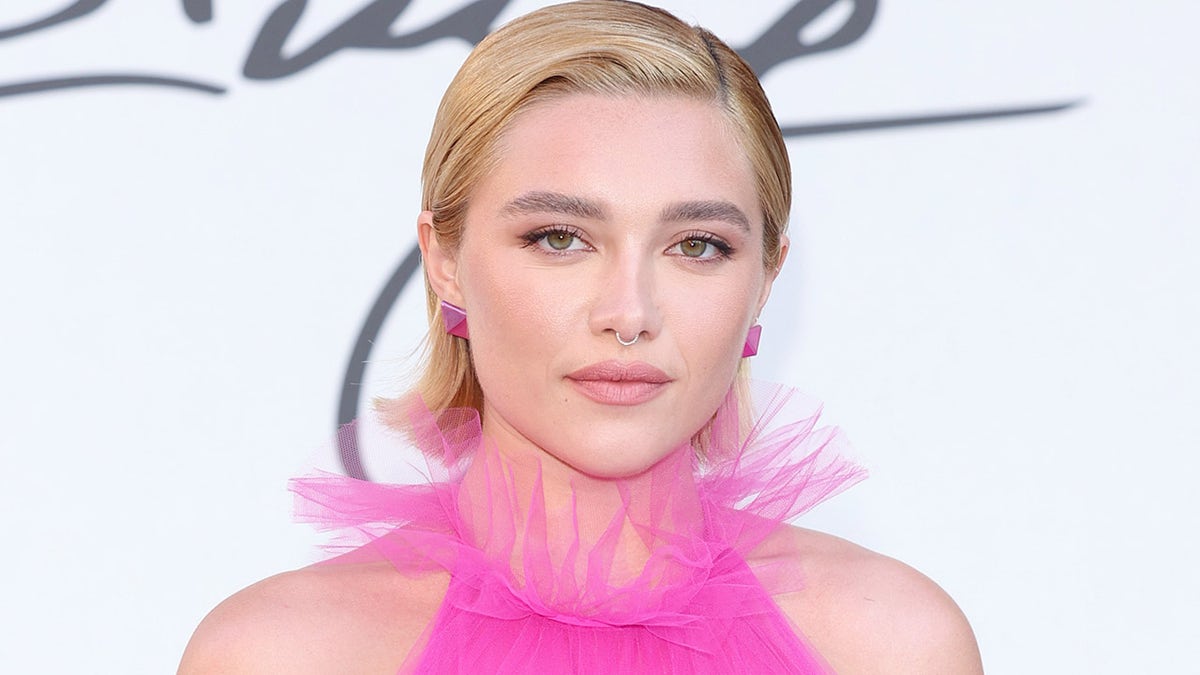 Florence Pugh defended her choice to wear a sheer pink gown on Friday