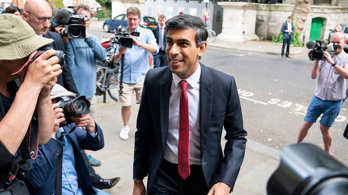 Conservative leadership candidate Rishi Sunak, centre, arrives for a hustings event with the Conservative Councillors' Association, in Westminster, central London, Thursday July 21, 2022. The two candidates to become Britain’s next prime minister have begun a head-to-head battle for the votes of Conservative Party members who will choose the country’s new leader.