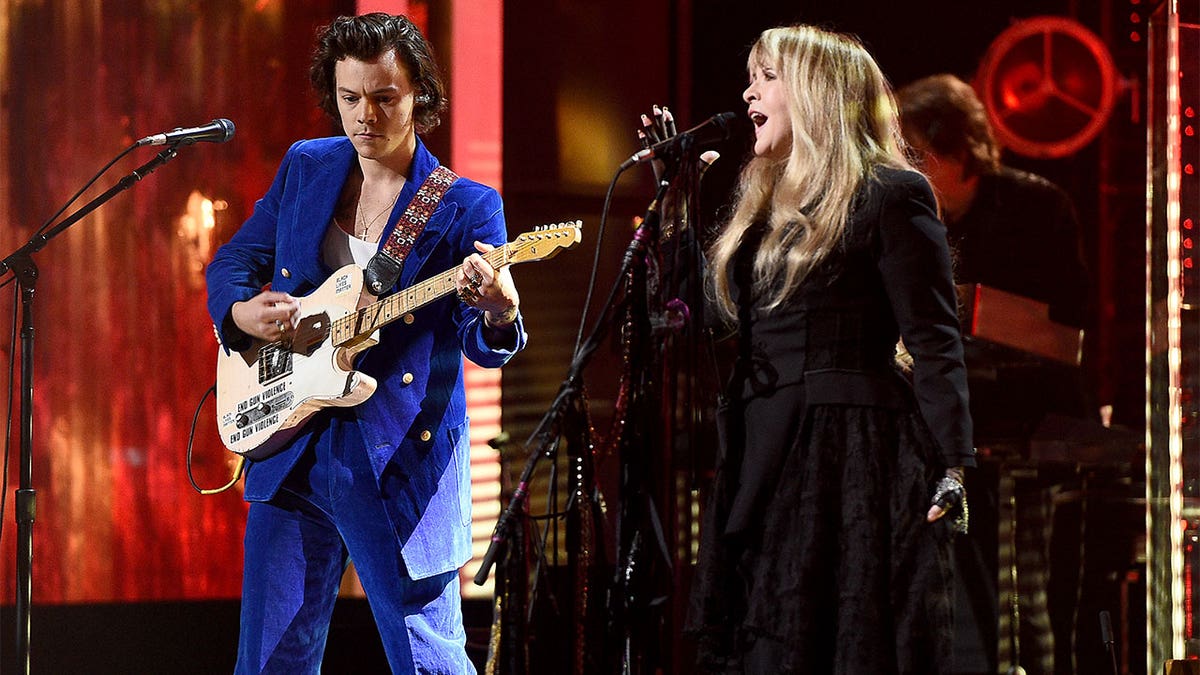Stevie Nicks and Harry Styles performing