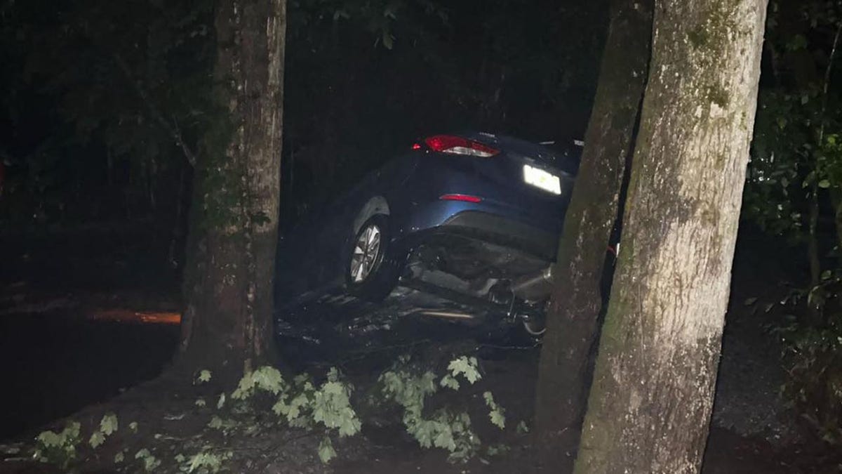 Car swept away in flash flooding