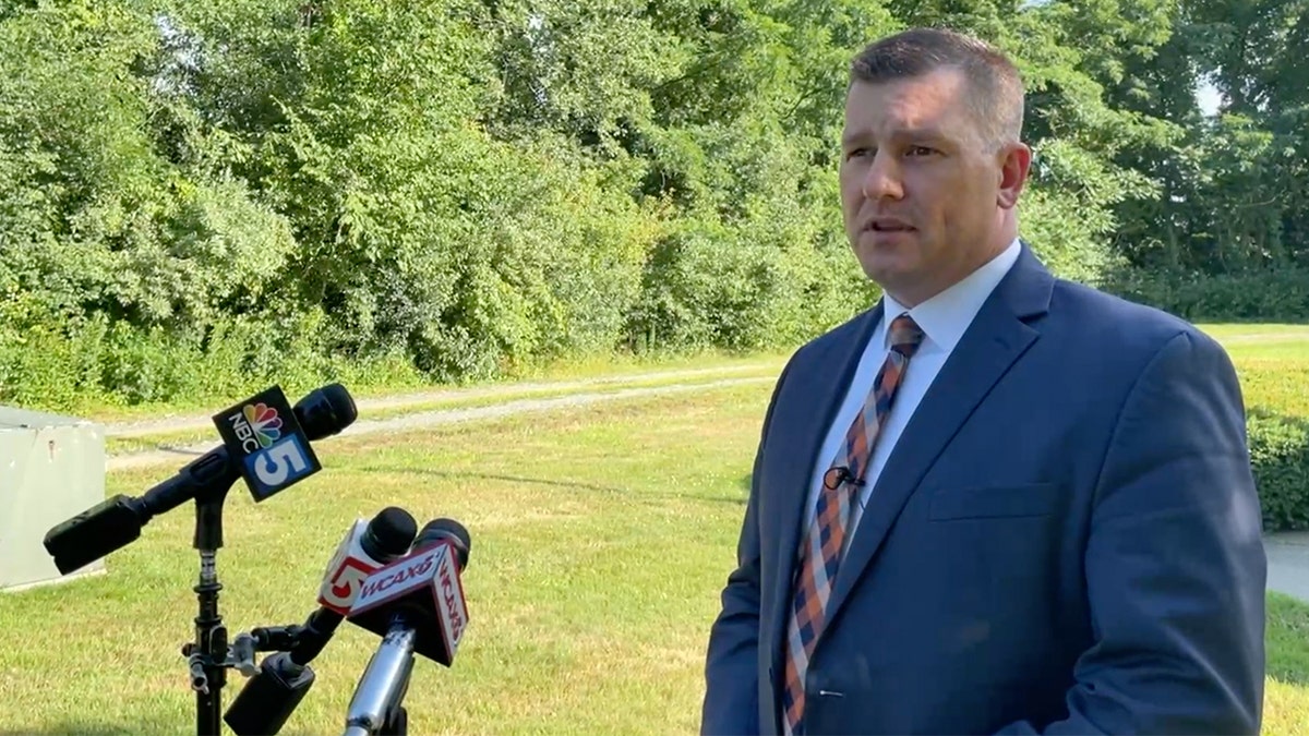 Vermont State Police Major Dan Trudeau holds a news briefing