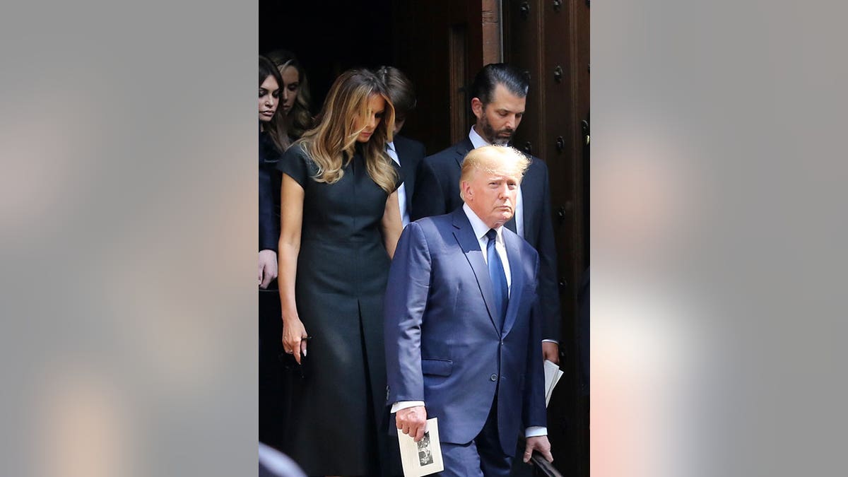 Former President Donald Trump is followed by his adult children and Melania Trump after Ivana Trump's funeral service.