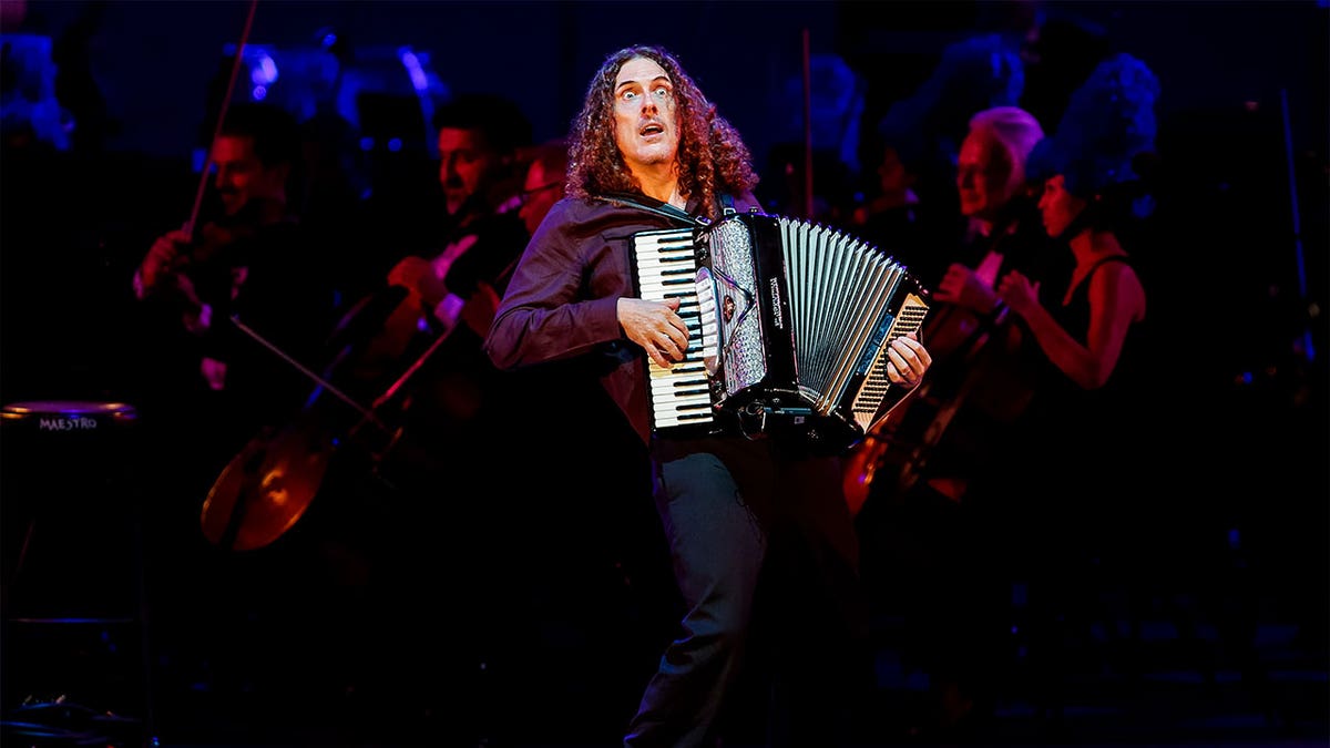 "Weird" Al Yankovic performing during "The Simpsons Take the Bowl," event