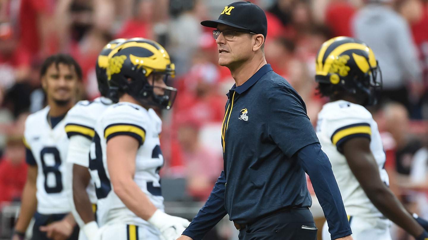 Harbaugh Returns to Michigan as Honorary Captain Amidst Coaching Ban