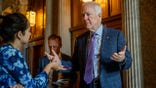 John Cornyn speaks to reporters