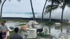 Wild video shows wave crash beachside Hawaii wedding