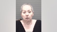 Michigan woman accused in husband's 2002 murder turned over by Italian authorities