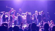 Guitar legend Carlos Santana collapses on stage during concert in Michigan