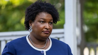 Abrams blasted for slashing pay to staff after loss &mdash; despite raising over $100M