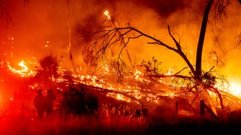 CA wildfire temporarily traps 4th of July travelers