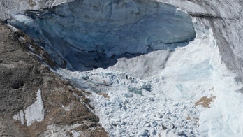 Italy rescuers finding body parts, gear on glacier after avalanche