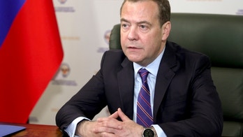 Putin aide warns against US pressing for war crimes court