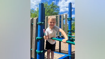 Paralyzed Chicago parade attack victim awake, looking for his twin brother