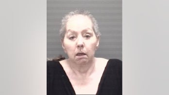 Michigan woman accused in husband's 2002 murder turned over by Italian authorities