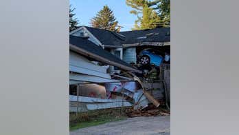 Car slams into Chicago-area home leaving 2 seriously injured