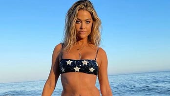 Denise Richards rocks patriotic bikini to celebrate July 4th on the beach after joining OnlyFans