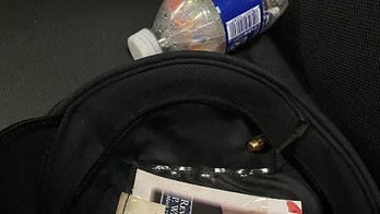 Philadelphia cop shot in head found bullet lodged in his hat; both officers released from hospital