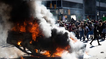 Virginia man who set police car ablaze during George Floyd riot sentenced to 364 days, avoids deportation