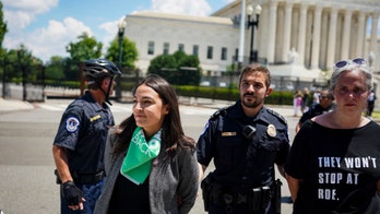 PolitiFact slammed for 'fact-check' on Ocasio-Cortez arrest where she seemed to pretend to wear handcuffs