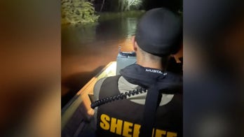 Michigan rescue crews save 6 people stranded on log-jammed river