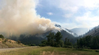 West wildfires: Crews make progress in Idaho, California