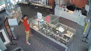 All smash, no grab: man caught on film attempting to rob jewelry store with a brick