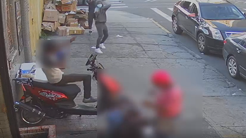 NYC gunmen open fire near woman, child in wheelchair