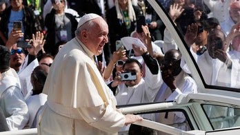 Pope Francis says he must cut down on travel or consider retirement: 'The door is open'
