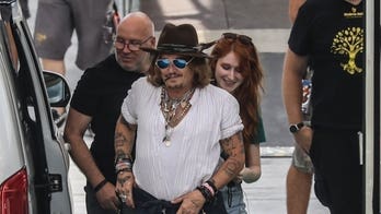 Johnny Depp's redheaded mystery woman's identity revealed