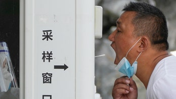 Chinese authorities apologize for COVID-19 break-ins