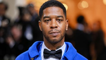 Kid Cudi gets skateboarding lessons from pro skater Tony Hawk