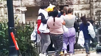 Video appears to show migrants led from bus to DC church, located steps away from US Capitol