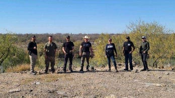 Christian militia group steps in to help besieged border officials amid massive migrant crisis