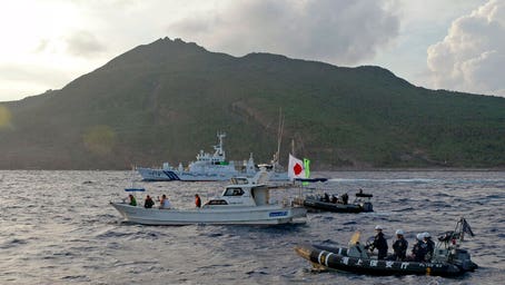 Japan lodges protest after Chinese, Russian warships spotted near disputed islands