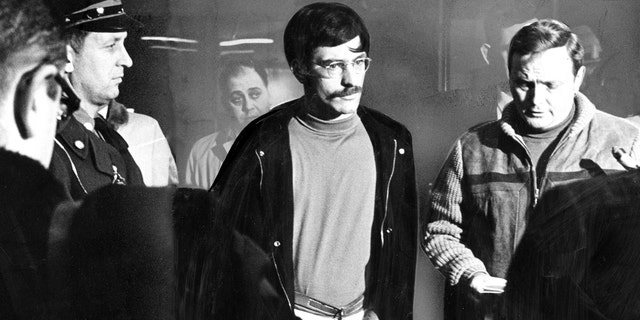 Antone C. Costa, 24, of Provincetown, Mass., was charged with the murders of two Rhode Island women at the Massachusetts State Police Headquarters in Boston on March 5, 1969. Costa (center) was arrested in a Marlboro Street apartment in Boston's Back Bay, taken to the Yarmouth Barracks and arraigned the following day in Provincetown.
