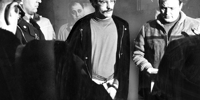 Antone C. Costa, 24, of Provincetown, Mass., was charged with the murders of two Rhode Island women at the Massachusetts State Police Headquarters in Boston on March 5, 1969. Costa (center) was arrested in a Marlboro Street apartment in Boston's Back Bay, taken to the Yarmouth Barracks and arraigned the following day in Provincetown.
