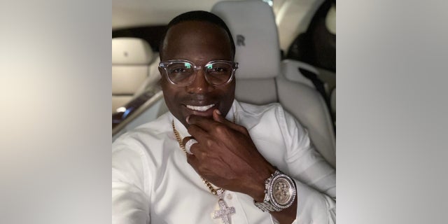 NYC Bishop Lamor Miller-Whitehead, founder of Leaders of Tomorrow International Churches in Brooklyn, smiles with pricey jewelry.