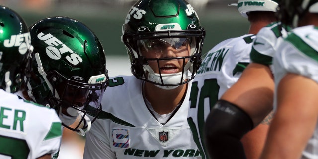 Quarterback Zach Wilson, #2 of the New York Jets, calls a play in the huddle during the Tennessee Titans vs New York Jets game at MetLife Stadium on October 3, 2021 in East Rutherford, New Jersey.