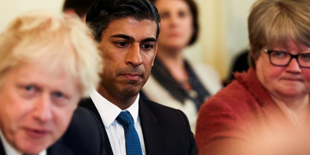 LONDON, ENGLAND - MAY 17: British Chancellor of the Exchequer Rishi Sunak listens (C) as Prime Minister Boris Johnson speaks at the weekly cabinet meeting at Downing Street on May 17, 2022 in London, England. (Photo by Henry Nicholls-WPA Pool/Getty Images)