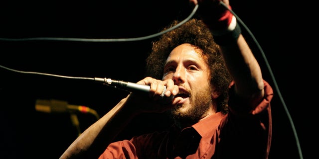 Lead singer Zack de la Rocha performs with Rage Against the Machine at their reunion concert during the Coachella Music Festival in Indio, California April 29, 2007. The band split up in 2000. (REUTERS/Mario Anzuoni)