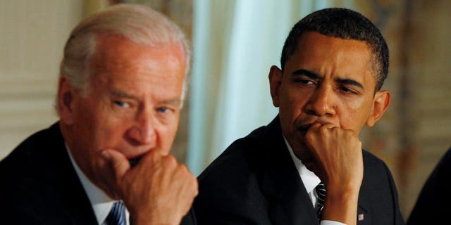 Former-President Barack Obama and then-Vice President Joe Biden participate in a cabinet meeting at the White House in Washington, D.C., on June 8, 2009.    REUTERS/Jason Reed/File Photo