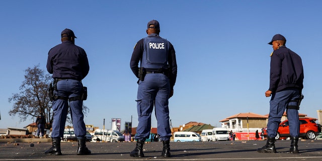 Police officers during a protest in Soweto, South Africa, June 20, 2022. REUTERS/Siphiwe Sibeko